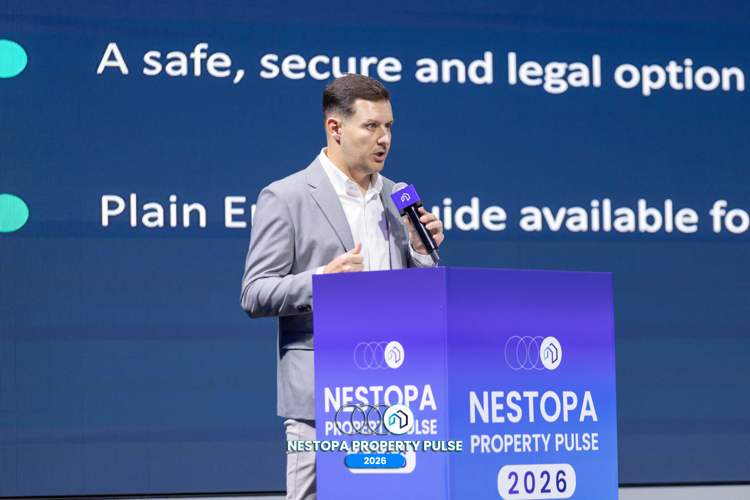 Speaker presenting a legal property session at Nestopa Property Pulse Pattaya 2026